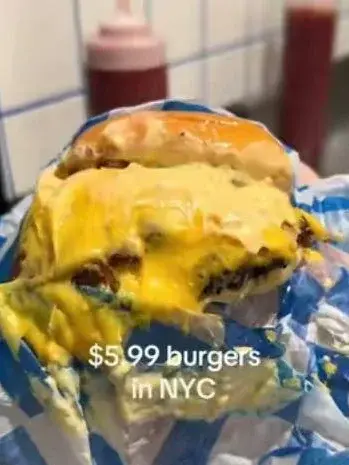 Video preview of a double smash burger with the text $5.99 burgers in NYC